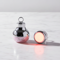 NuraEye advanced collagen eye cream with small round red LED light therapy device set